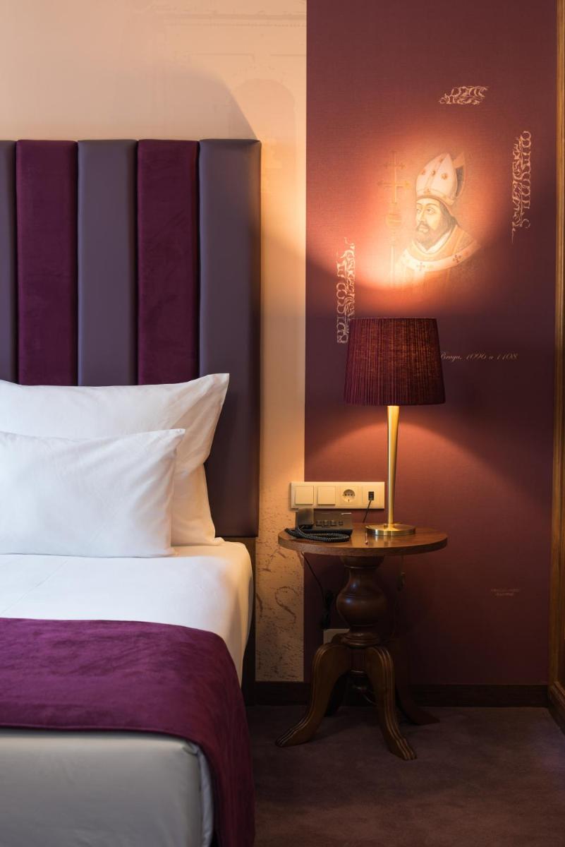 Uma cama ou camas num quarto em Vila Gale Collection Braga