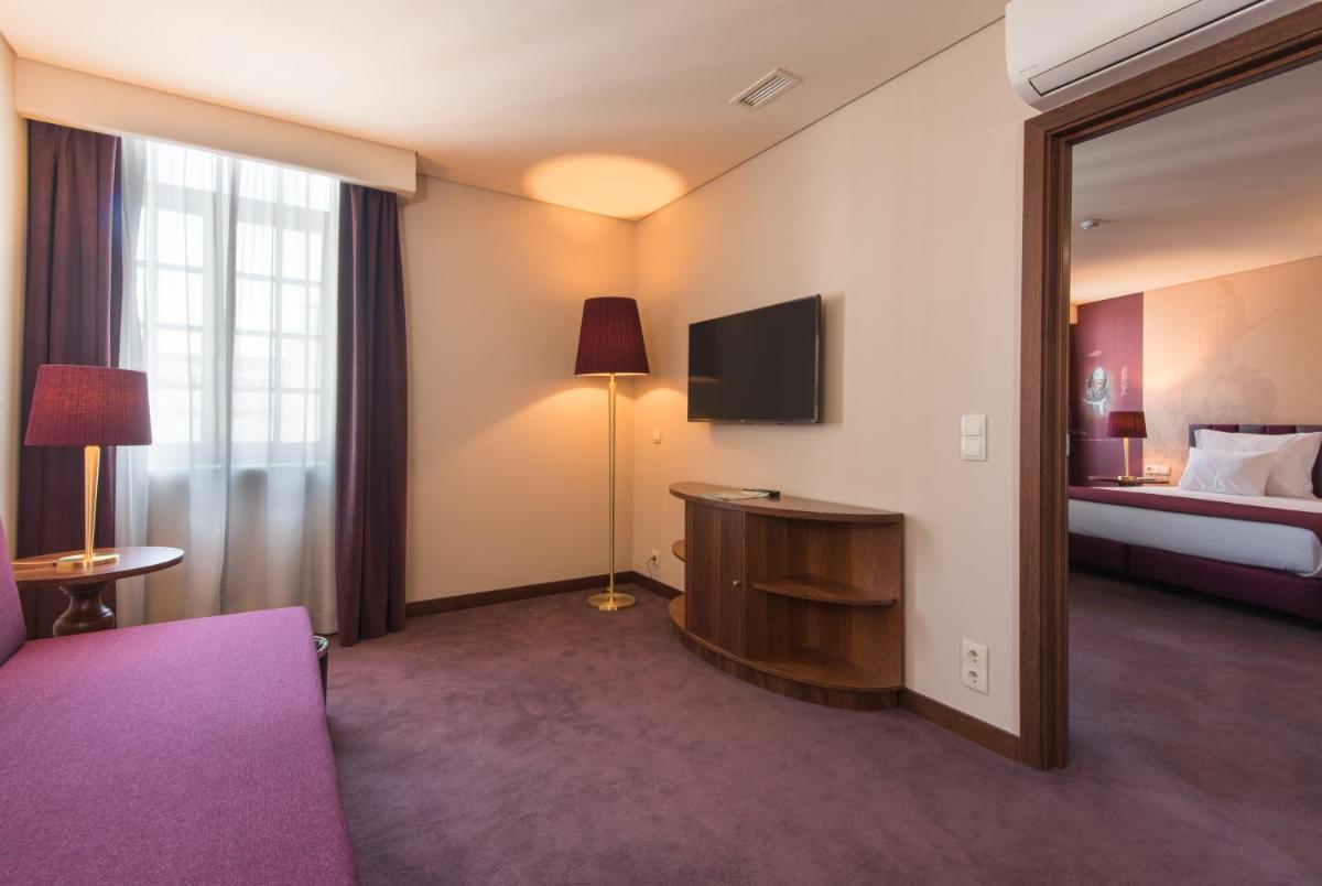 Uma cama ou camas num quarto em Vila Gale Collection Braga