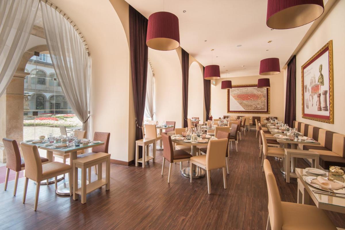 Um restaurante ou outro lugar para comer em Vila Gale Collection Braga