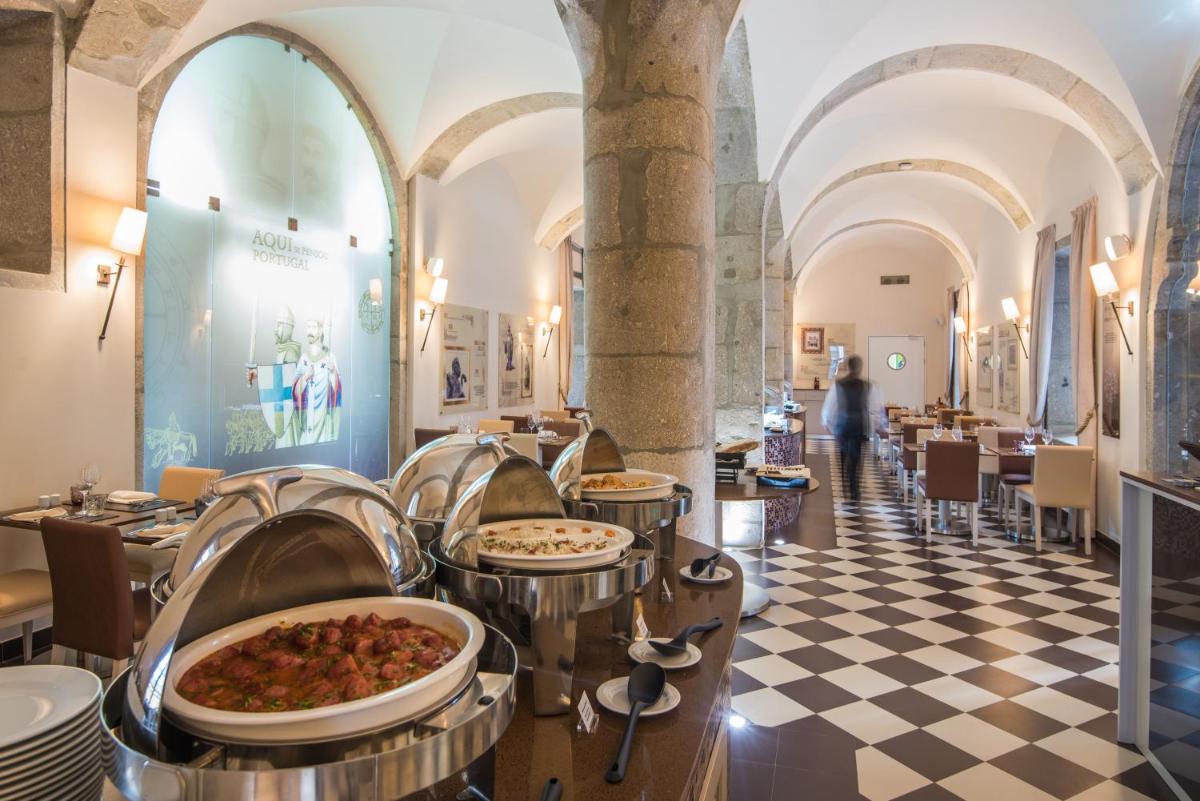 Um restaurante ou outro lugar para comer em Vila Gale Collection Braga