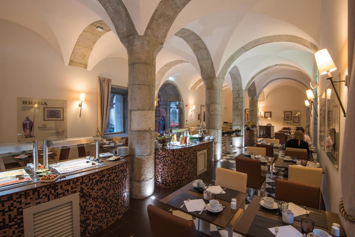 Um restaurante ou outro lugar para comer em Vila Gale Collection Braga