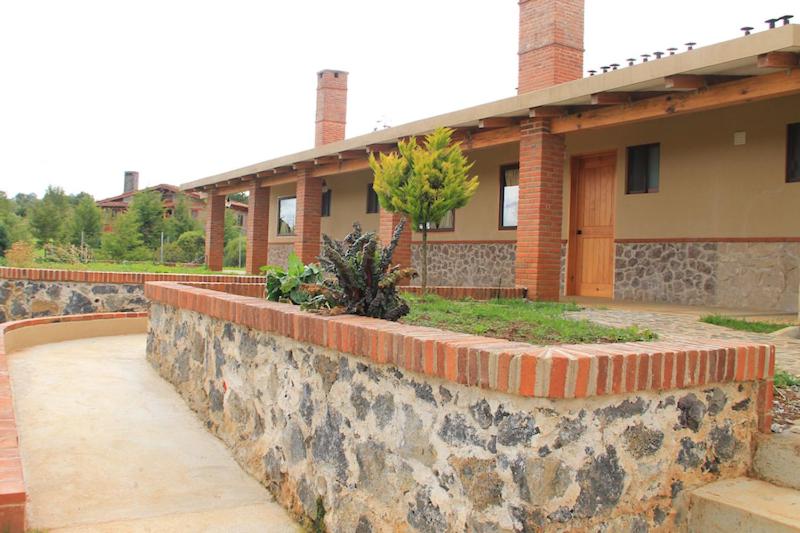 Suitetrails - HOTEL Y CABAÑAS MOUNTAIN LODGE