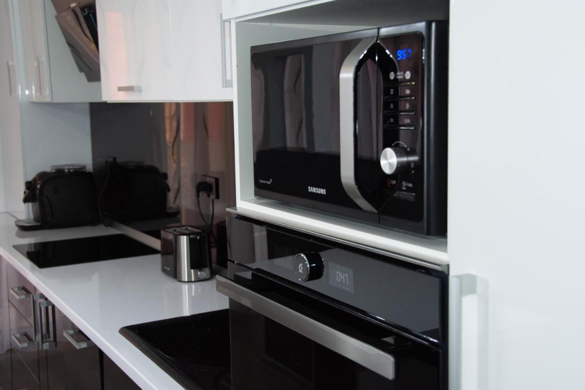 Modern minimalist apartment in Oradea - Housity