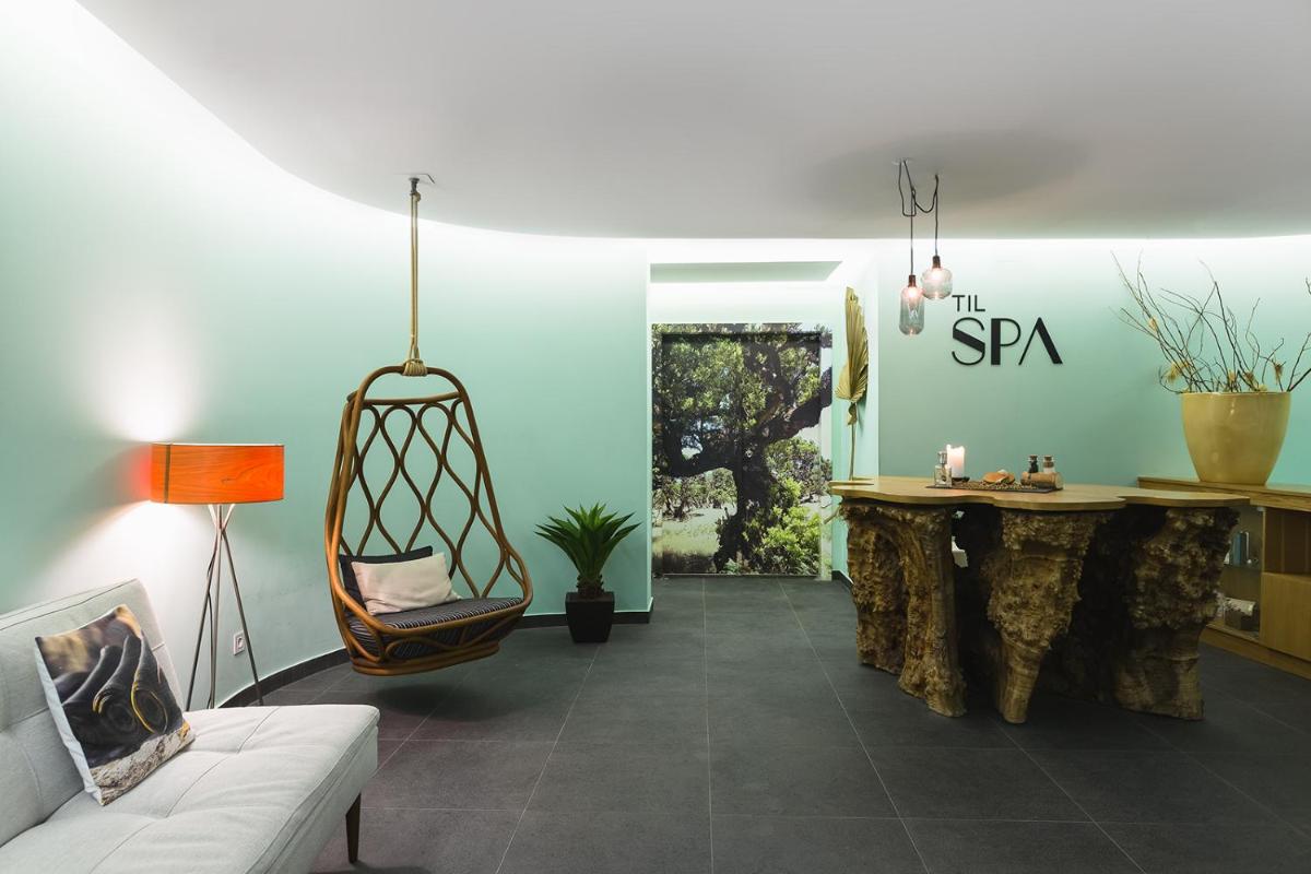 Uma área de estar em Castanheiro Boutique Hotel