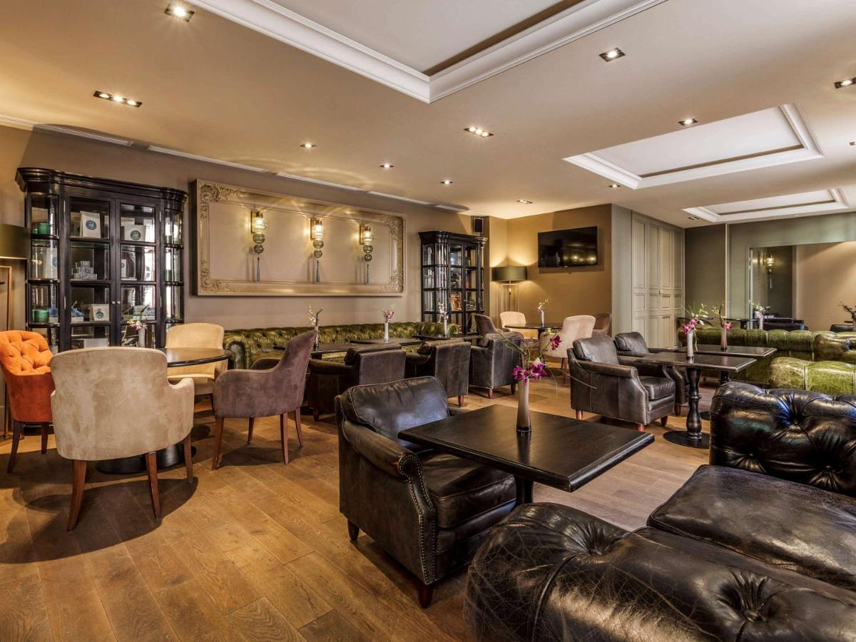 Coin salon dans l'établissement La Cour des Consuls Hotel & Spa Toulouse - MGallery Collection