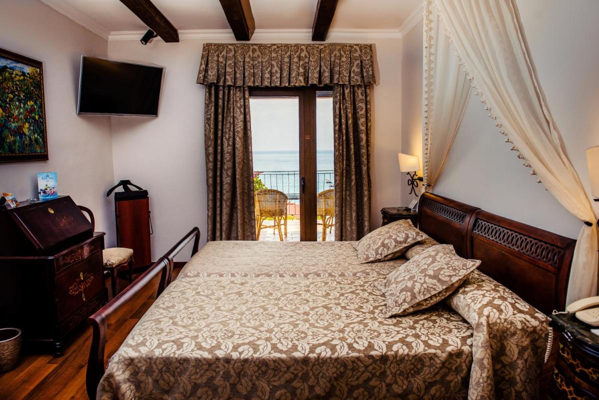 Cama o camas de una habitación en Rigat Park & Spa Hotel - Adults Recommended