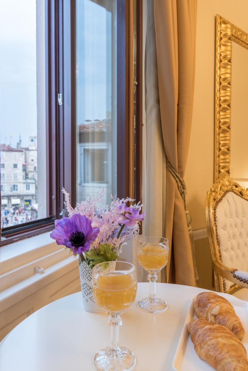 Central Square Heritage Hotel - Housity