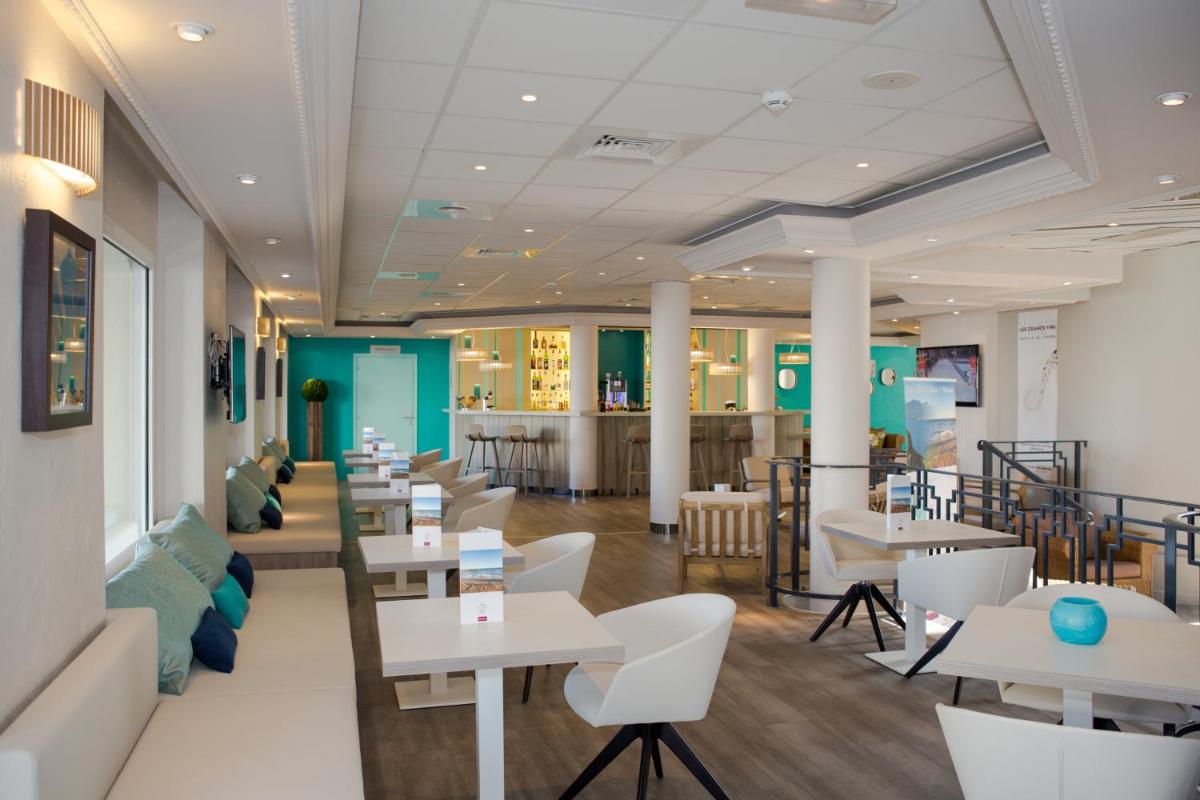 Coin salon dans l'établissement Mercure Thalasso & Spa Port Fréjus