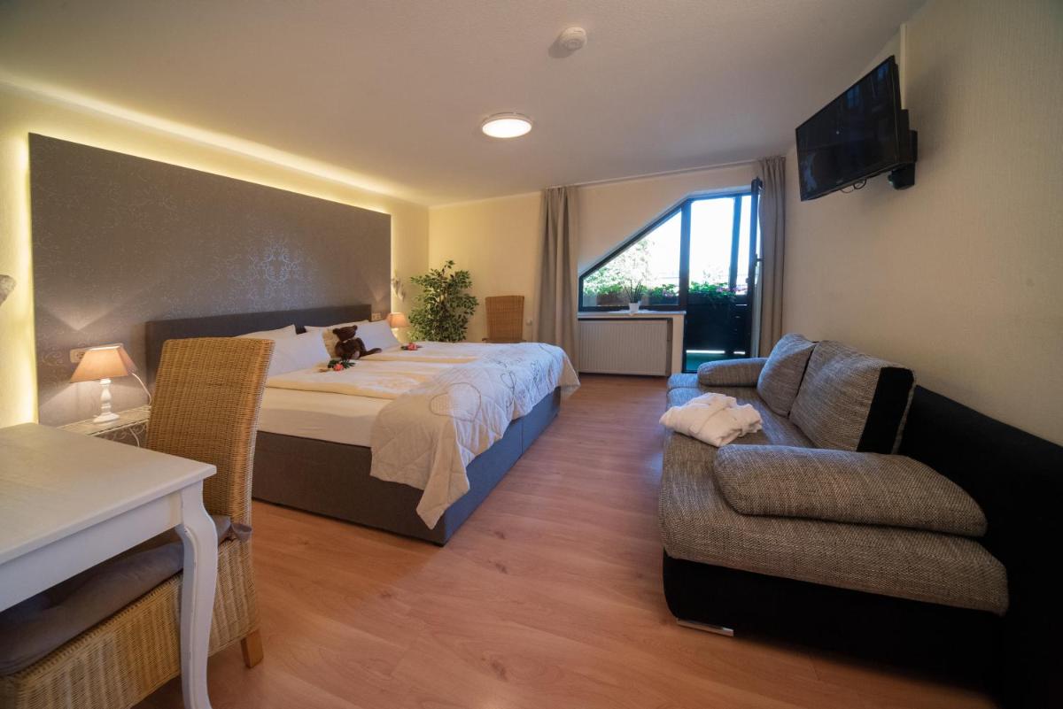 Hotel Garni Zum Grünen Baum - Housity