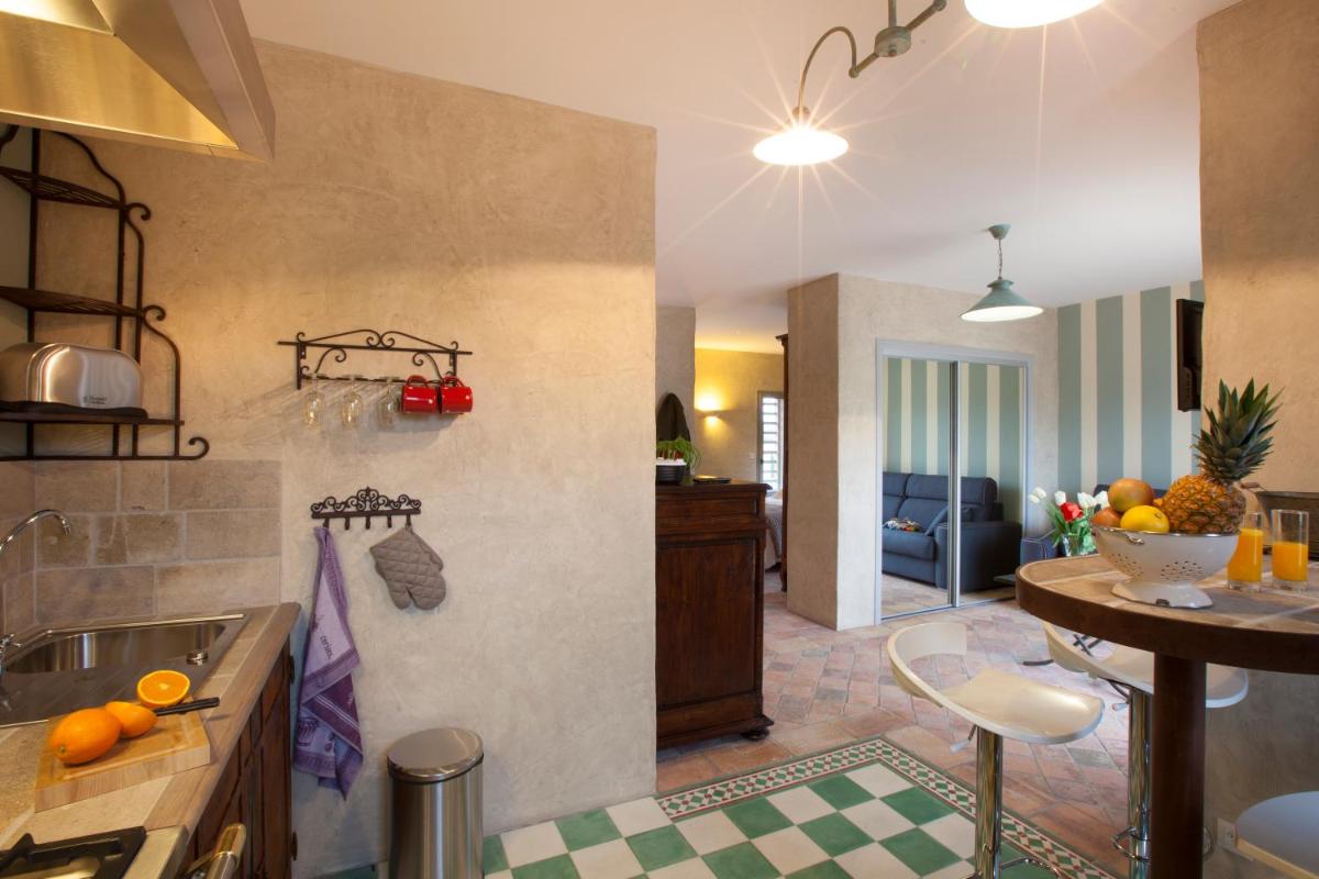 Cuisine ou kitchenette dans l'établissement Hôtel-Spa Le Saint Cirq