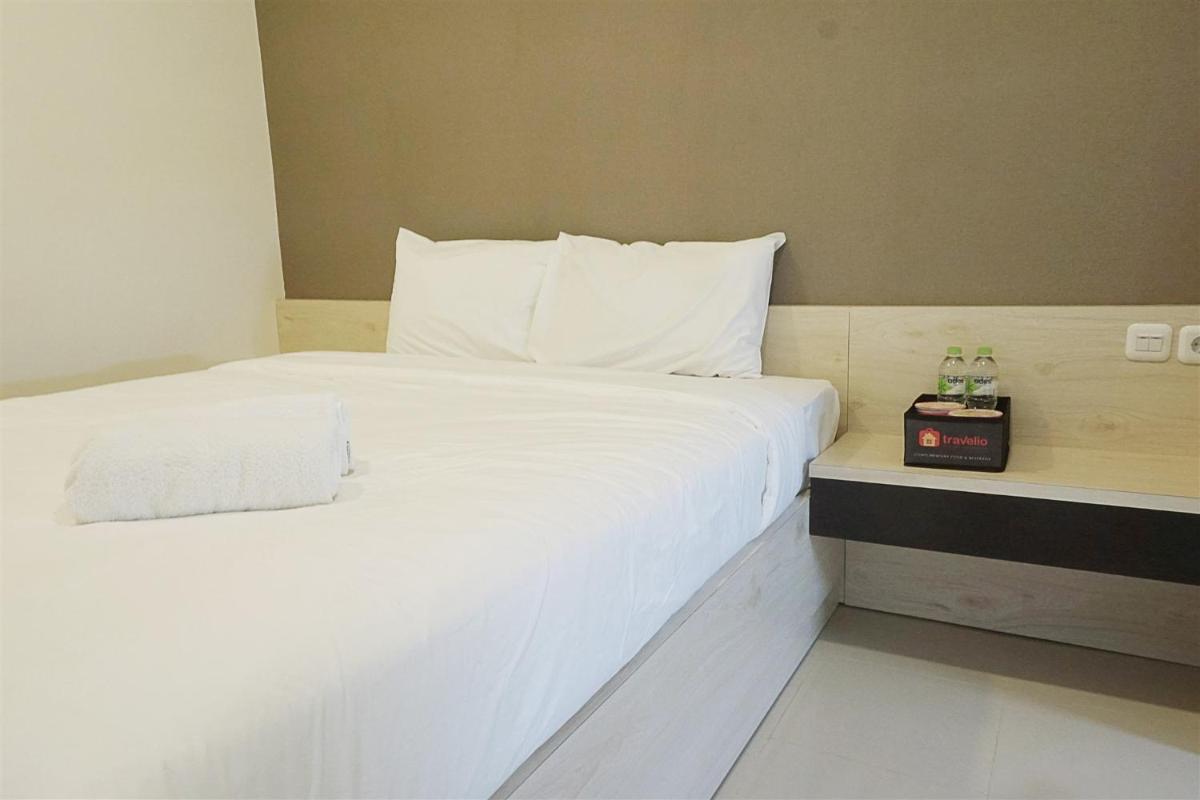 Homey 2BR Apartment at Parahyangan Residence near Parahyangan University By Travelio - Housity