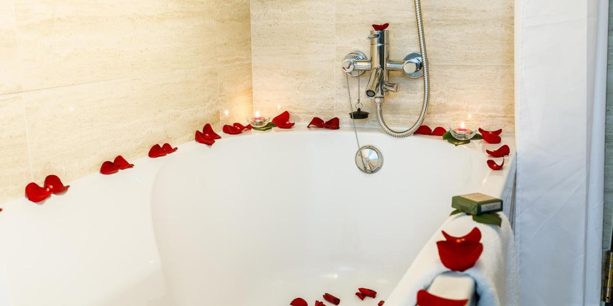 Uma casa de banho em Aurea Fatima Hotel Congress & Spa