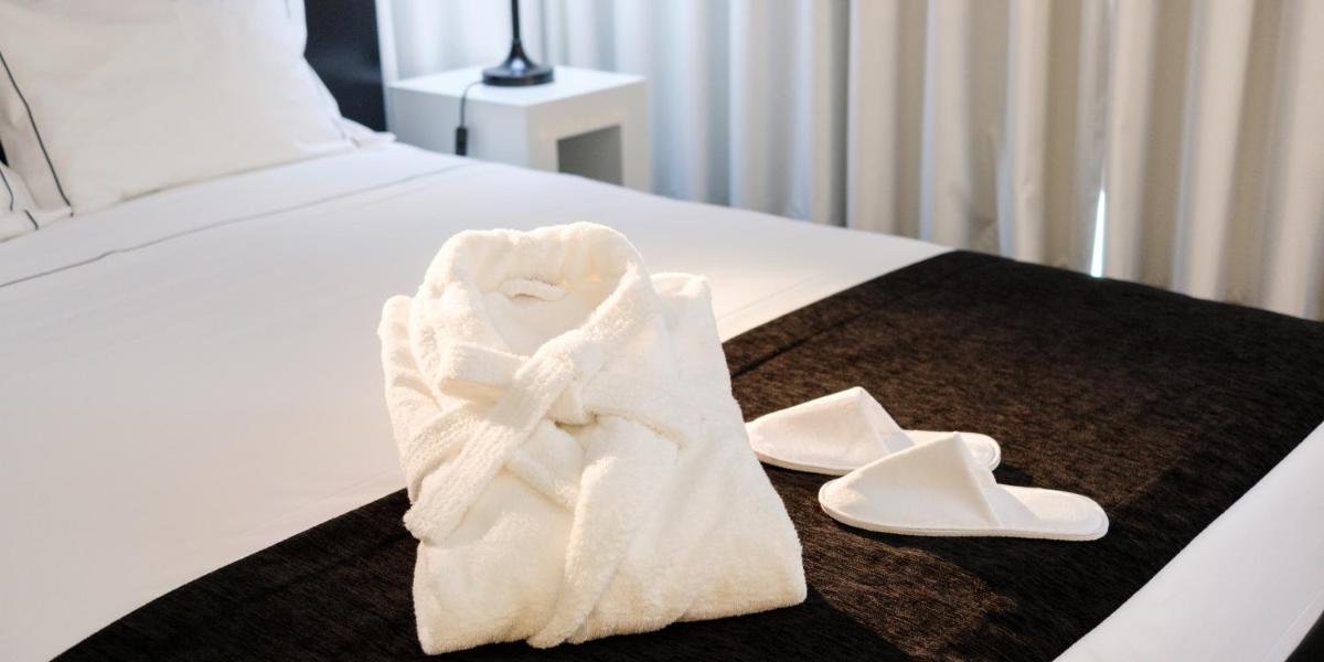 Uma cama ou camas num quarto em Aurea Fatima Hotel Congress & Spa