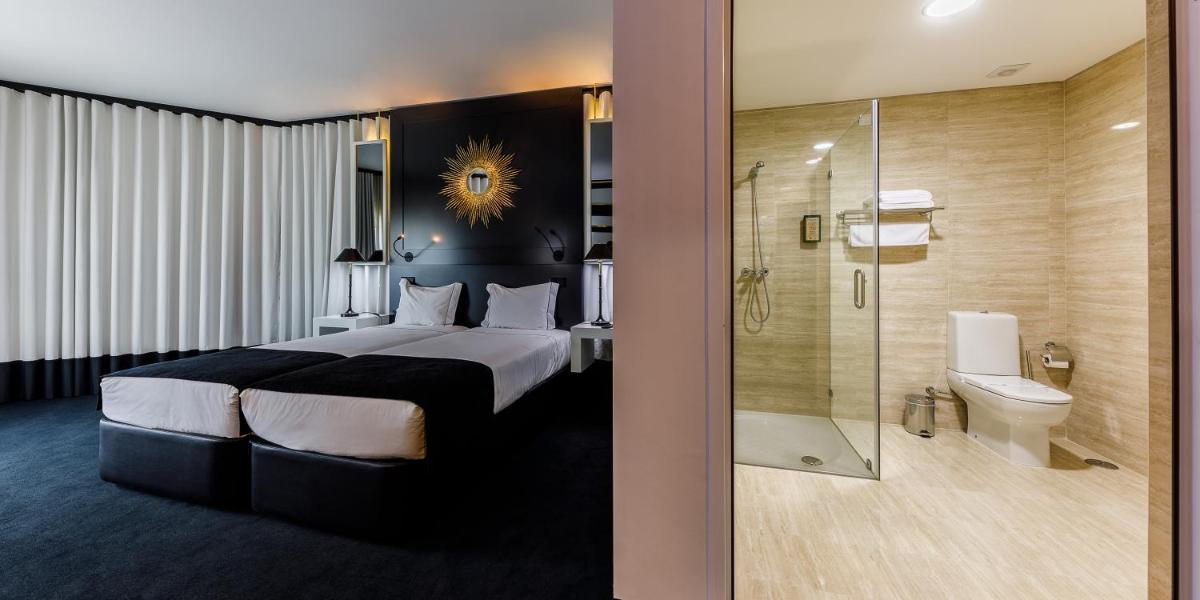 Uma casa de banho em Aurea Fatima Hotel Congress & Spa
