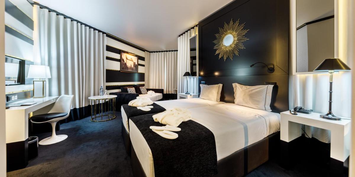 Uma cama ou camas num quarto em Aurea Fatima Hotel Congress & Spa