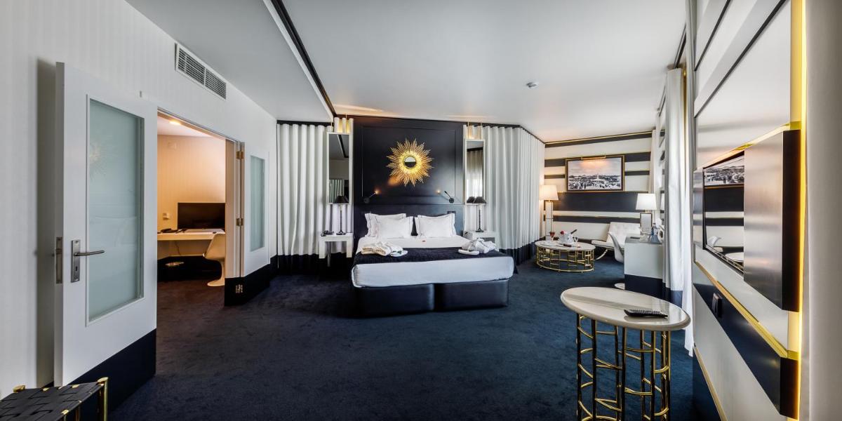 Uma cama ou camas num quarto em Aurea Fatima Hotel Congress & Spa