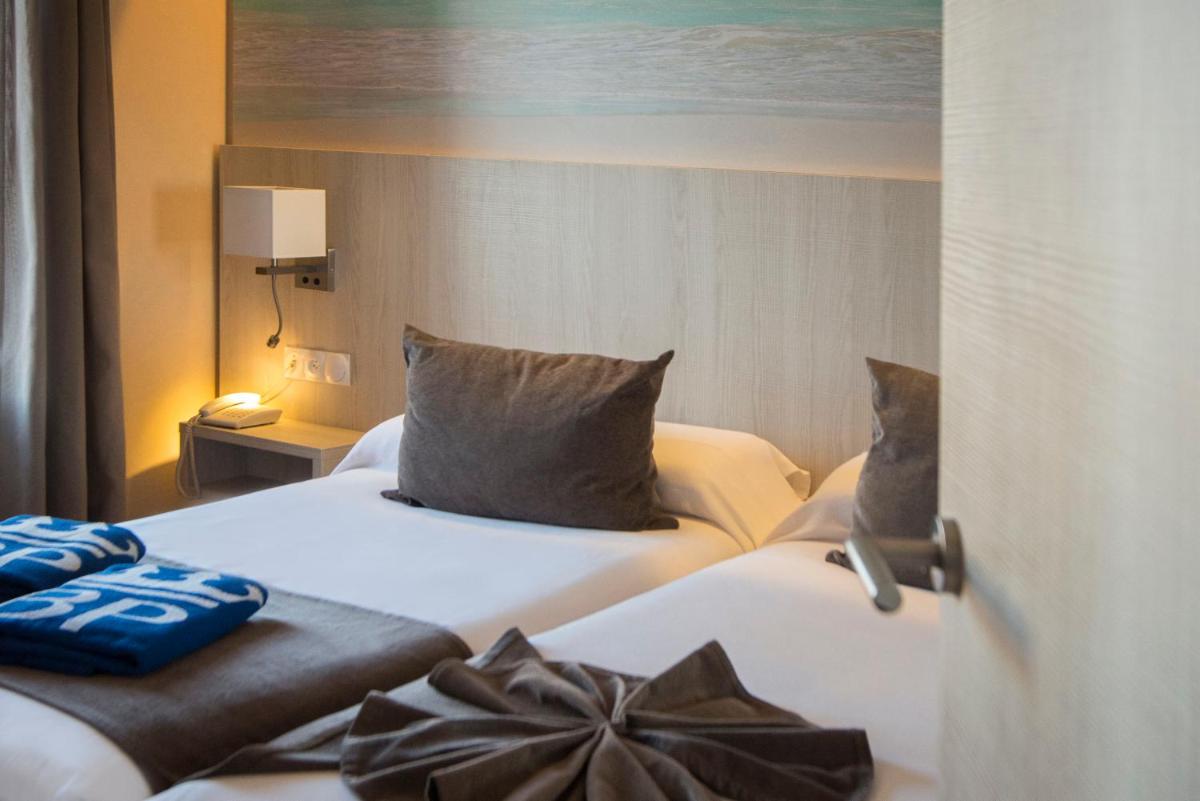 Cama o camas de una habitación en Benalmadena Palace Spa