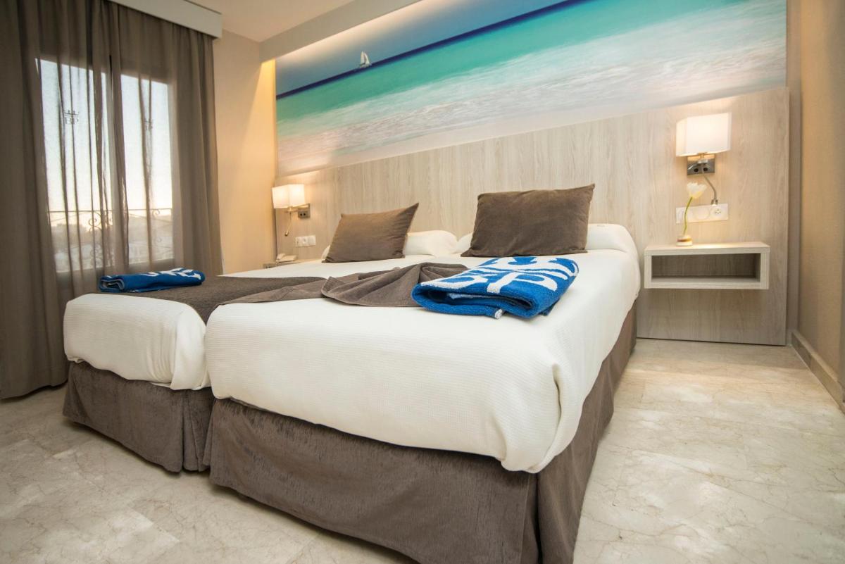 Cama o camas de una habitación en Benalmadena Palace Spa