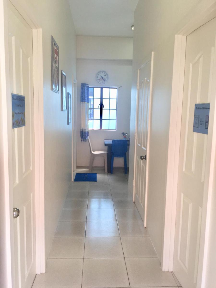 Blue Summer Suites Family Room - Housity