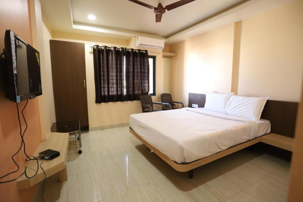 Hotel Pride Executive - Housity