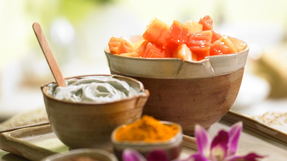two bowls of food on a tray with flowers at Taj City Centre Gurugram in Gurgaon