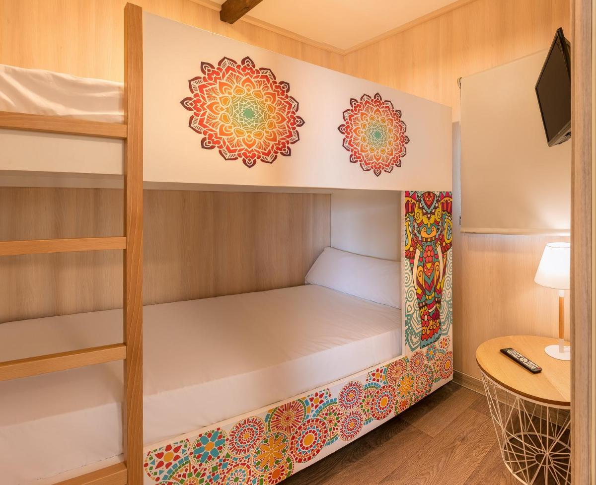 Cama o camas de una habitación en Magic Natura Resort