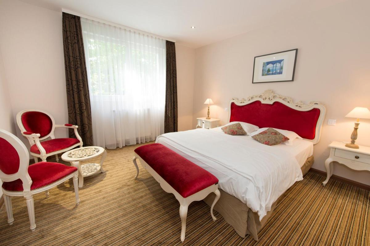 Un ou plusieurs lits dans un hébergement de l'établissement Hôtel du Parc, Restaurant, Spa & Wellness