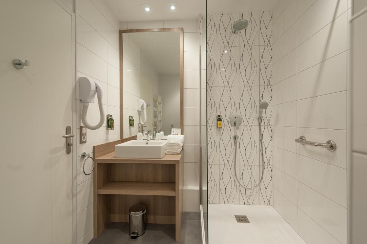 Salle de bains dans l'établissement Hotel & Spa Radiana