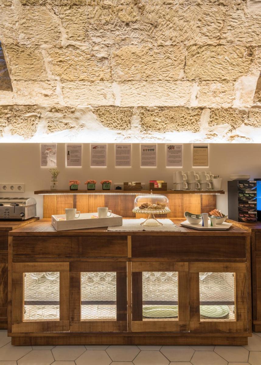 Una cocina o zona de cocina en Boutique Hotel Sant Roc & Spa