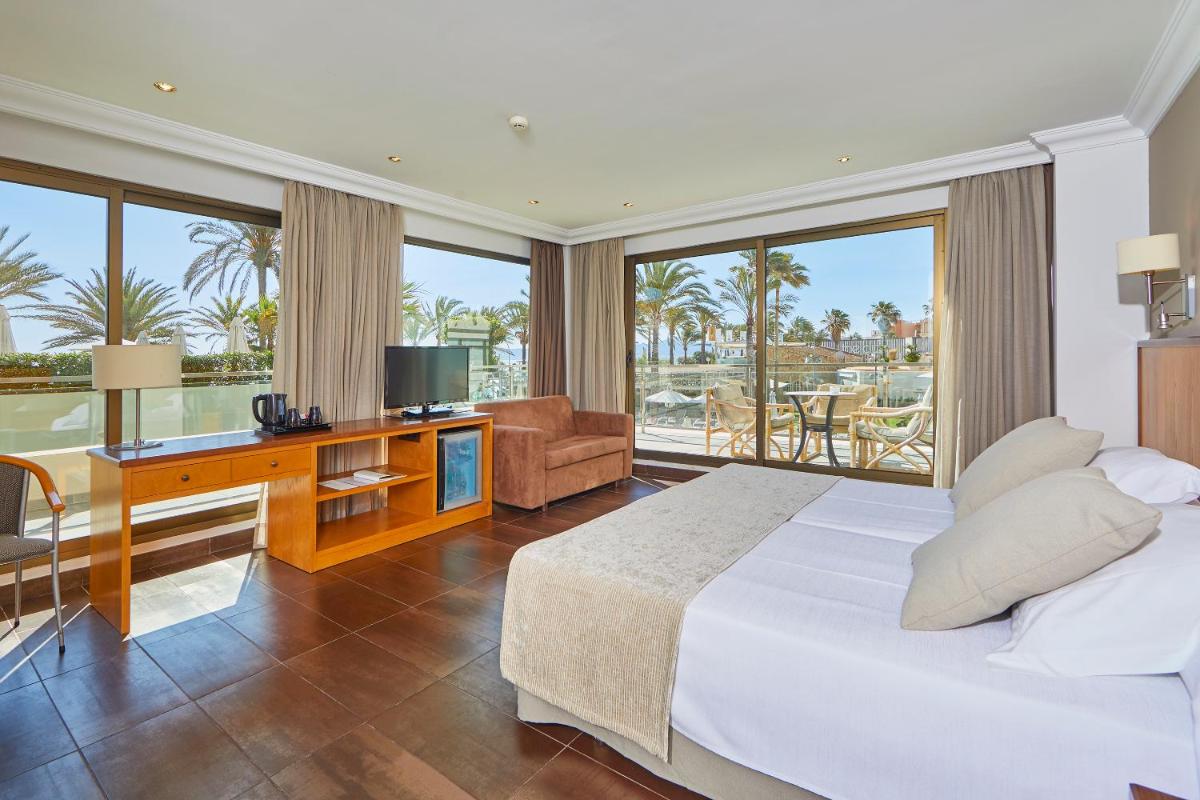 Cama o camas de una habitación en Hotel Playa Golf - Adults Only