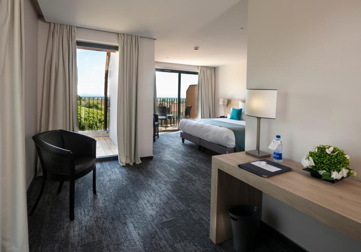 Un ou plusieurs lits dans un hébergement de l'établissement Best Western Plus Hotel & SPA Le Schoenenbourg