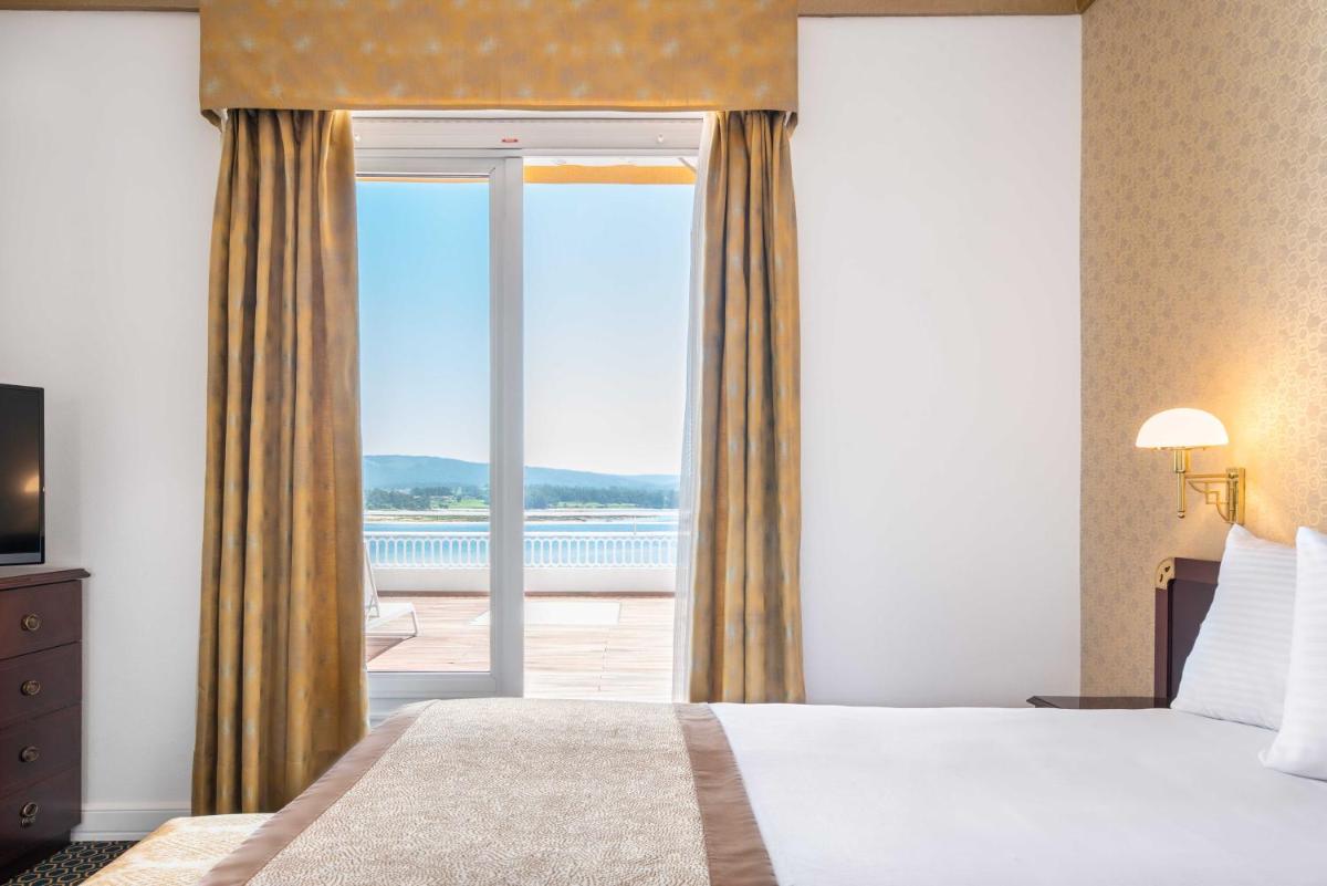 Cama o camas de una habitación en Eurostars Gran Hotel La Toja