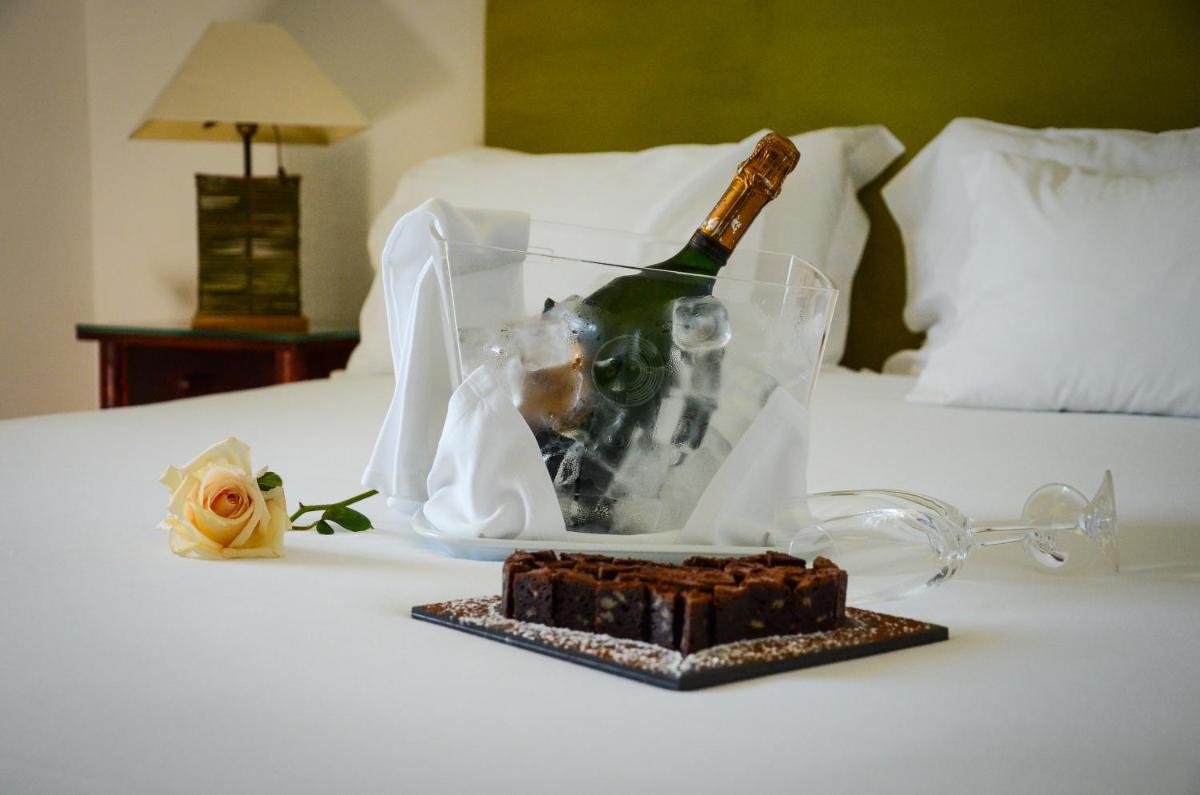 Uma cama ou camas num quarto em Hotel Golf Mar