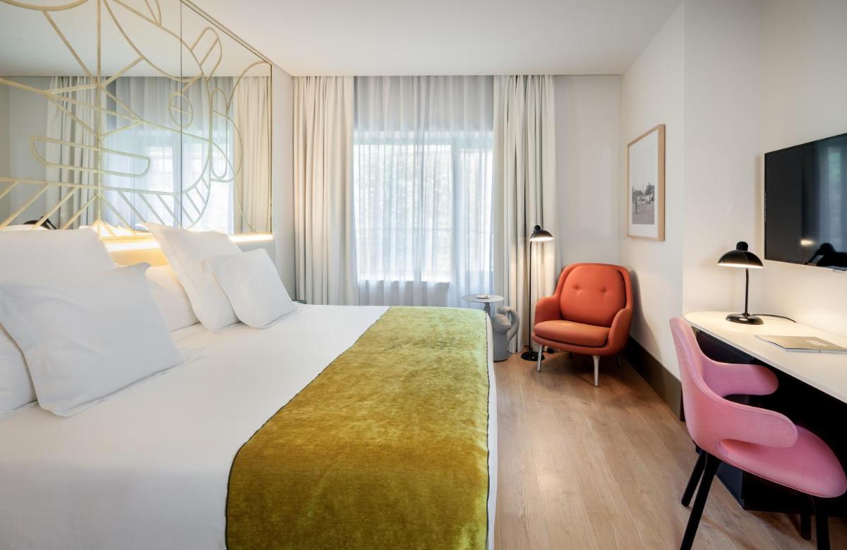 Cama o camas de una habitación en Barceló Torre de Madrid
