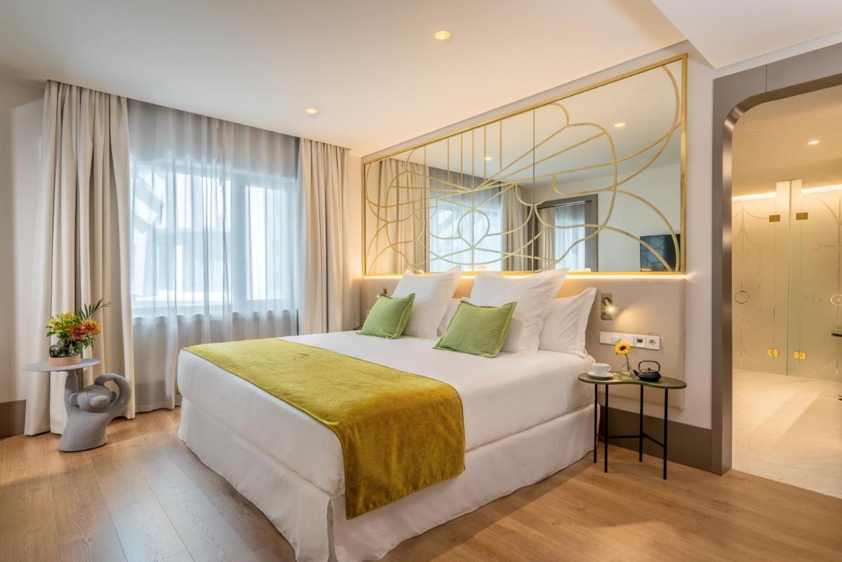 Cama o camas de una habitación en Barceló Torre de Madrid