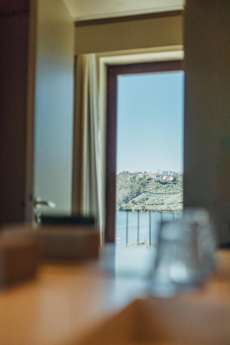 Uma cama ou camas num quarto em Octant Douro