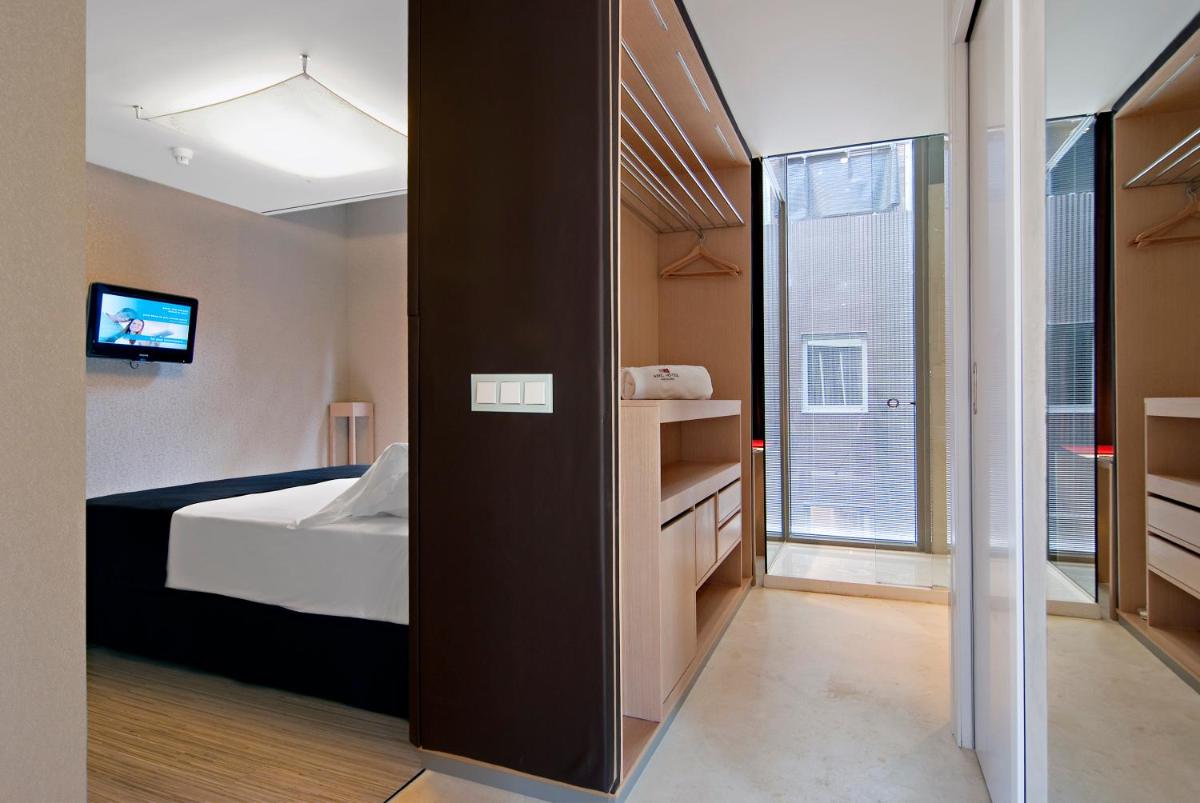 Cama o camas de una habitación en Axel Hotel Barcelona - Adults Only
