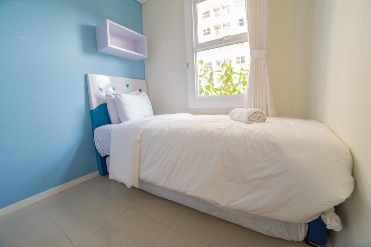 Cozy 2BR Apartment at Parahyangan Residence with Direct Access to Swimming Pool By Travelio - Housity