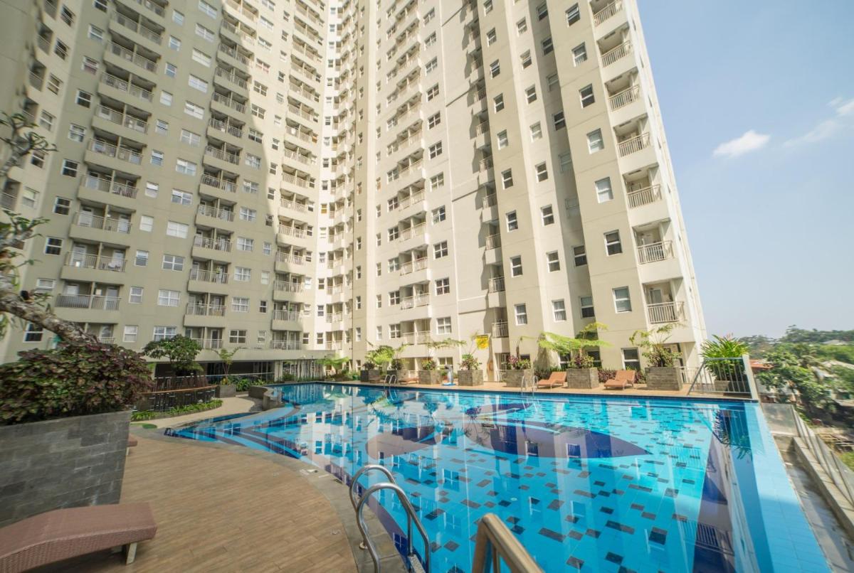 Cozy 2BR Apartment at Parahyangan Residence with Direct Access to Swimming Pool By Travelio - Housity