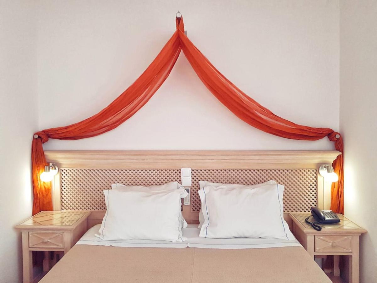 Uma cama ou camas num quarto em Hotel do Cerro
