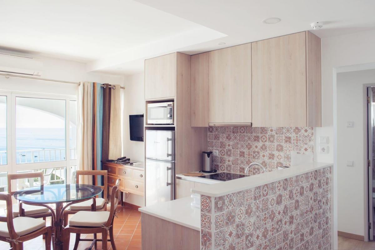 A cozinha ou kitchenette de Hotel do Cerro