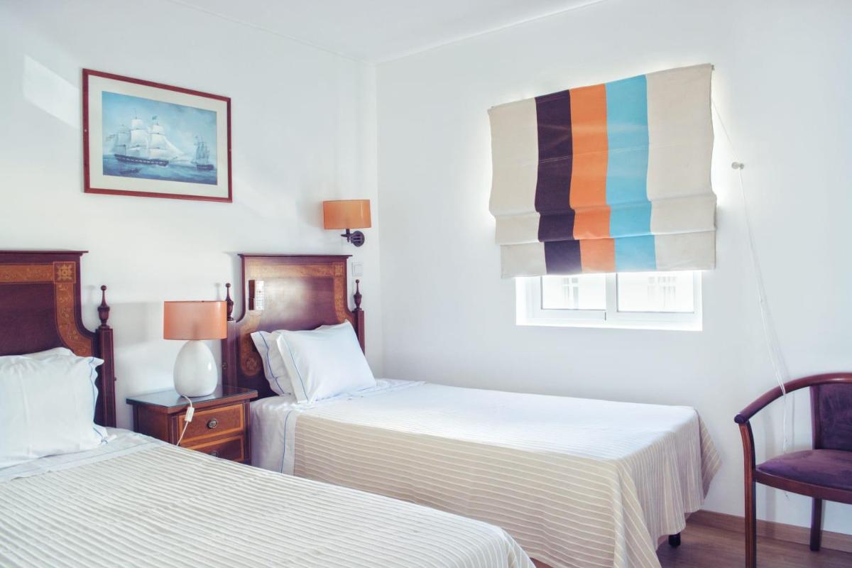 Uma cama ou camas num quarto em Hotel do Cerro