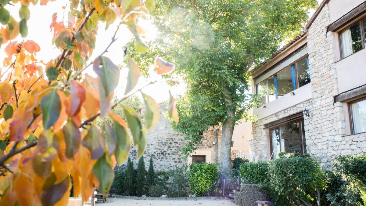 Jardín al aire libre en Hotel Cardamomo Sigüenza