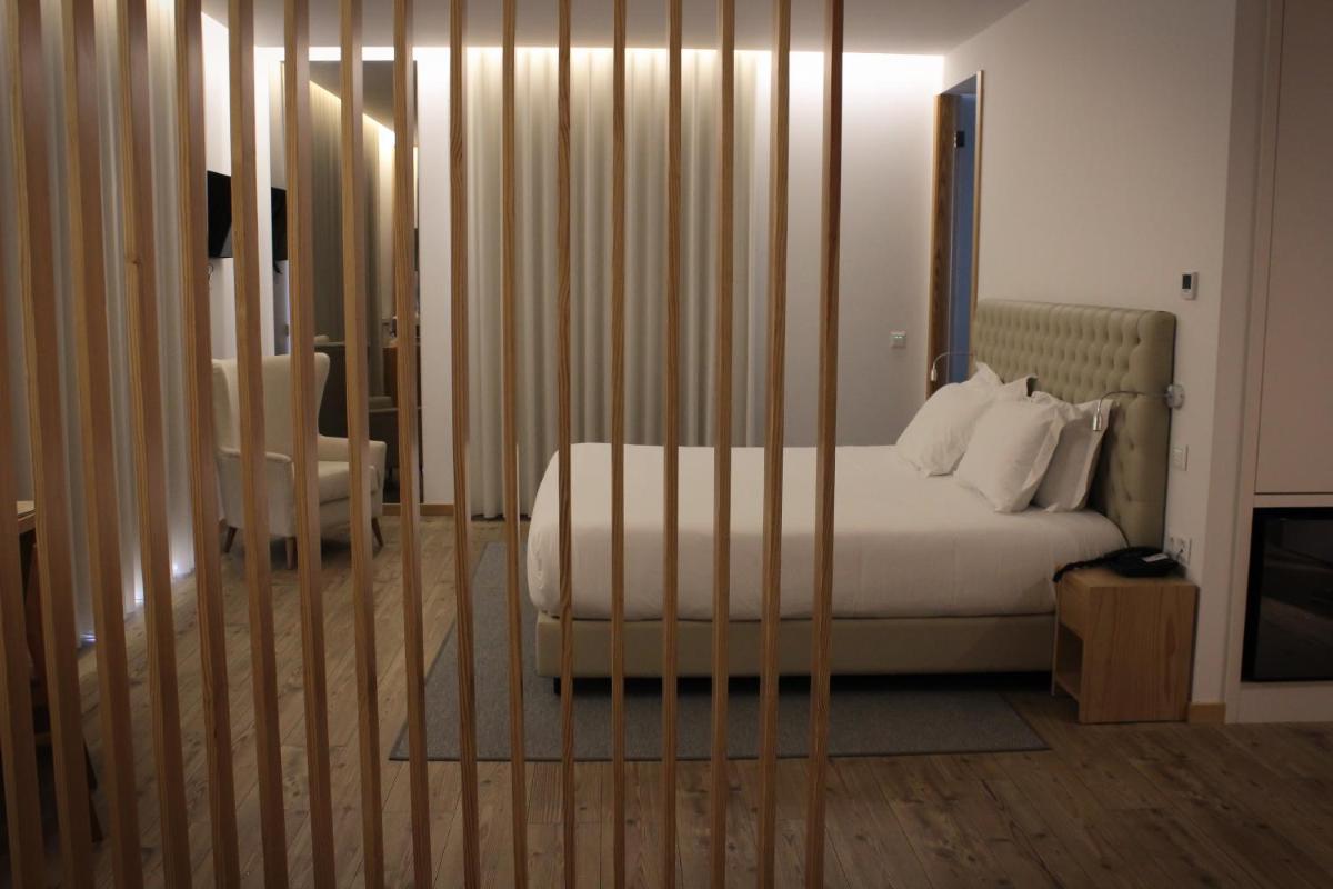 Uma cama ou camas num quarto em LAM Hotel Celorico de Basto