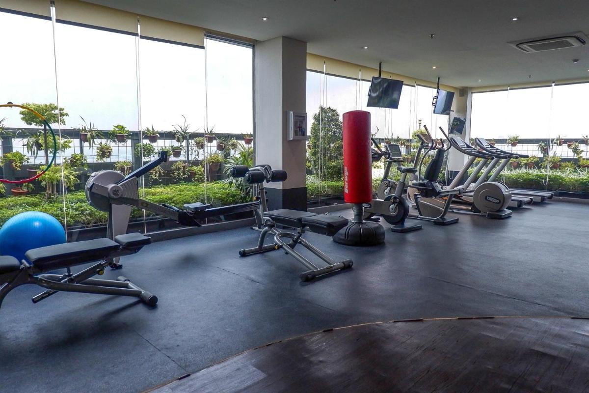 Comfy 1BR L'Avenue Apartment By Travelio - Housity