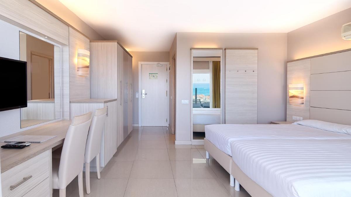 Cama o camas de una habitación en Bull Escorial & SPA