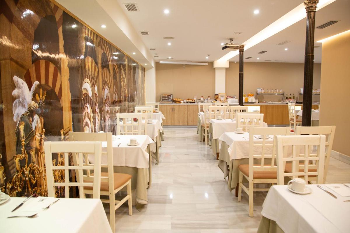 Un restaurante o sitio para comer en Soho Boutique Capuchinos & Spa