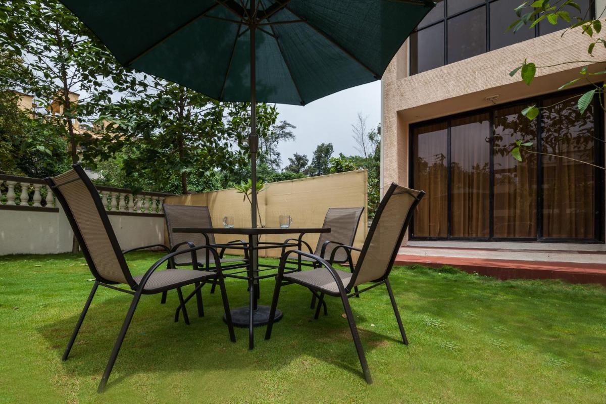 StayVista's Greenwoods Villa 1 - City-Center Villa with Private Pool, Terrace, Lift & Carrom Board - Housity