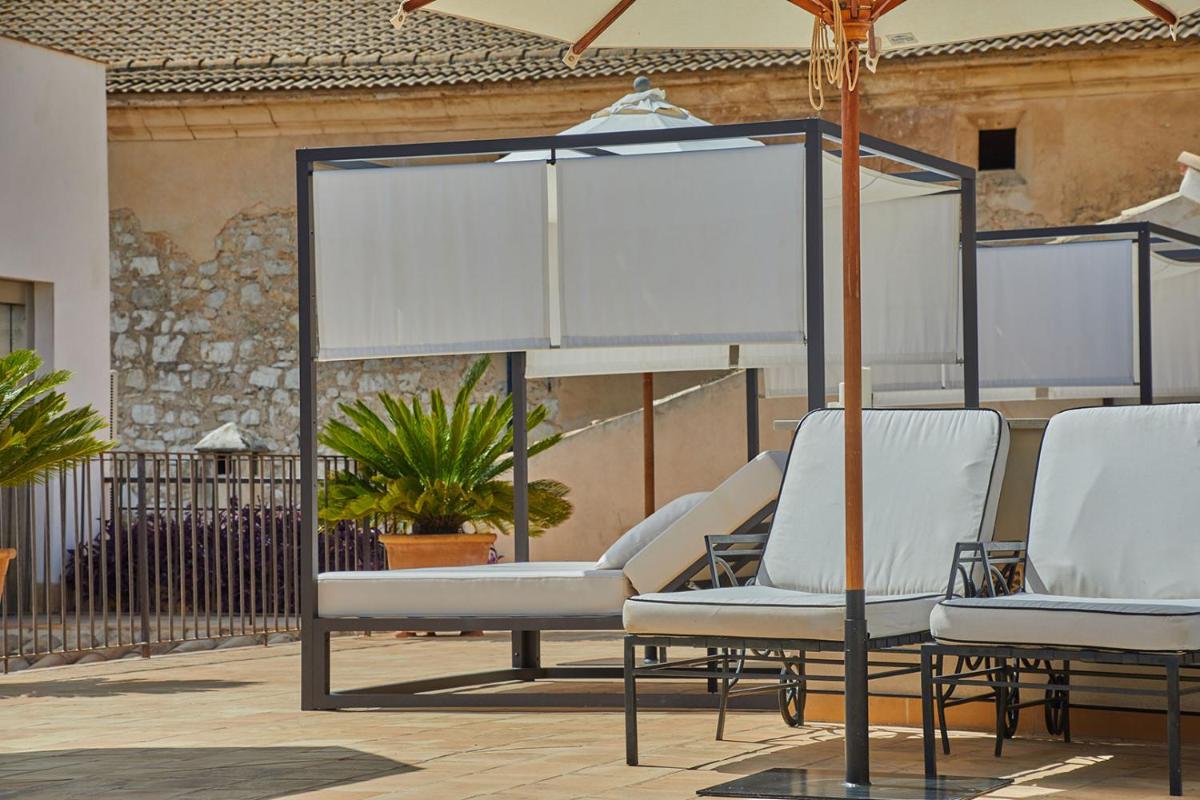 Un balcón o terraza de Cas Comte Suites & Spa - Adults Only