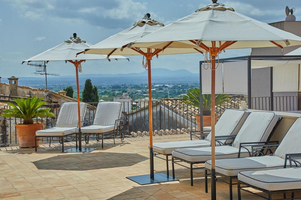 Un balcón o terraza de Cas Comte Suites & Spa - Adults Only